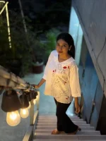 White Embroidered Tunic Top with Black Pants
