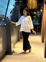 White Embroidered Tunic Top with Black Pants - Image 2